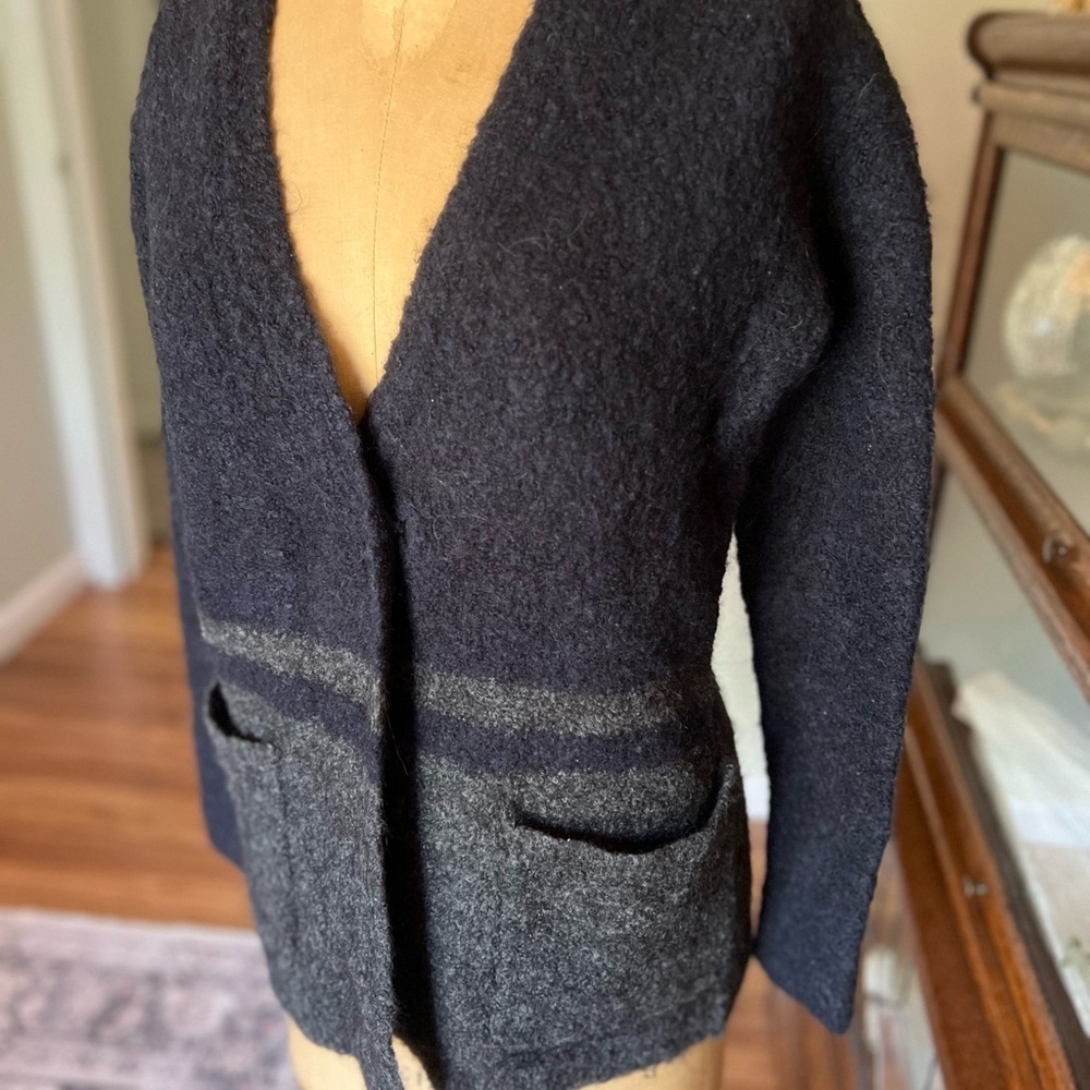 Madewell boyfriend sweater with two side by side buttons.